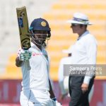 Dimuth Karunarathne rasing his bat to team mates after reaching his half century during the day 1 in 1st Test, between Sri Lanka Vs Pakistan held at Sheikh Zayed Cricket Stadium Abu Dhabi on 06th October 2017.